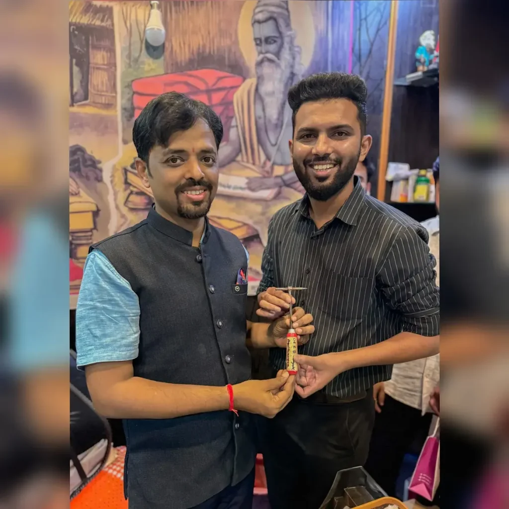Dr. Zeeshan Khan with an Ayurvedic professional at an Ayurveda event