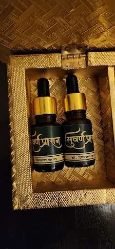 Detailed view of two Ayurvedic medicinal serum bottles