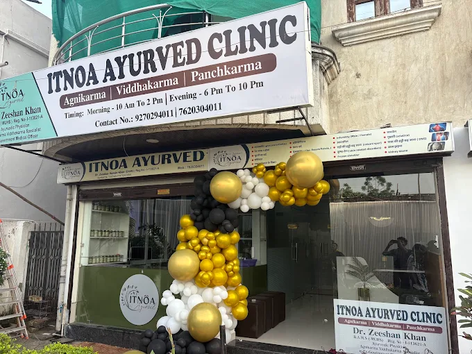 Main glass entrance and signage of ITNOA Ayurved Clinic