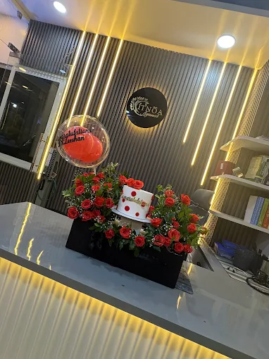 Decorated reception desk inside ITNOA Ayurved Clinic