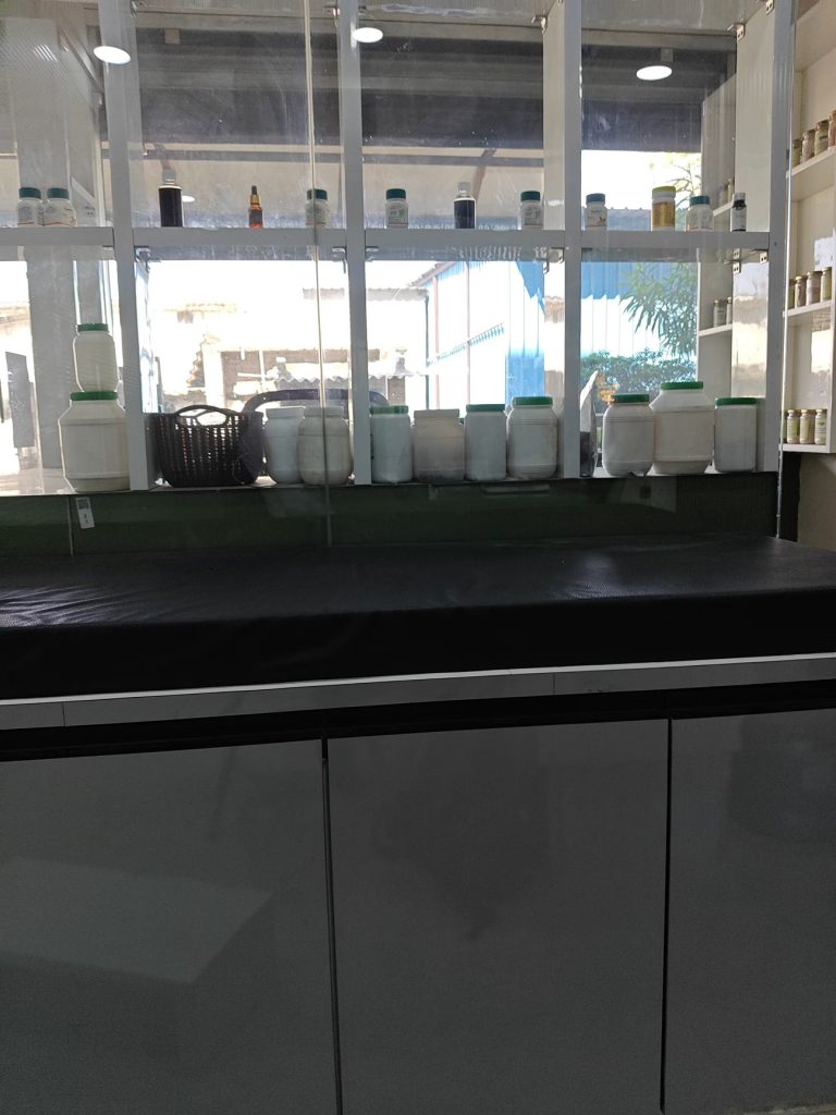 Medicine containers arranged in the ITNOA Ayurved Clinic clinic dispensary